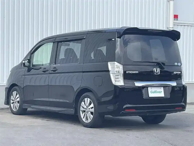 ホンダ ステップワゴン スパーダ パワーエディション 愛媛県 2013(平25)年 6万km プレミアムスパークルブラックパール 純正ナビ/（CD/DVD/AUX）/バックカメラ/ビルトインETC/両側パワースライドドア/キセノンヘッドライト/フォグランプ/オートライト/ステアリングスイッチ/パドルシフト/リモコンキー/純正16インチアルミホイール
