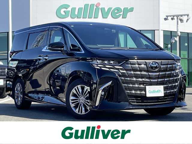 トヨタ アルファード Z 佐賀県 2024(令6)年 1.1万km ブラック /ワンオーナー//左右独立ムーンルーフ//デジタルインナーミラー//ユニバーサルステップ//トヨタチームメイト/　アドバンスパーク/　パーキングサポートブレーキ(周囲静止物)/　アドバンストドライブ/　緊急時操舵支援/　フロントクロストラフィックアラート/　レーンチェンジアシスト/　ドライバーモニターカメラ//純正14インチディスプレオオーディオプラス//純正13.2インチ有機EL後席ディスプレー//TV/HDMI//床下透過表示機能付パノラマミックビューモニター//ETC2.0//ステアリングヒーター//レザーシート//パワーシート(前席)//マイコンプリセットドライビングポジションシステム(運転席)//エグゼクティブパワーシート//18インチトリプルスポークスーパークロームメタリック塗装アルミホイール//セーフティセンス(予約安全パッケージ)/　プリクラッシュセーフティ/　レーントレーシングアシスト/　レーンディスパーチャーアラート/　全車速追従機能付きレーダークルーズコントロール/　アダプティブハイビームシステム/　ロードサインアシスト/　ドライバー異常時対応システム/　プロアクティブドライビングアシスト/　発信遅れ告知機能