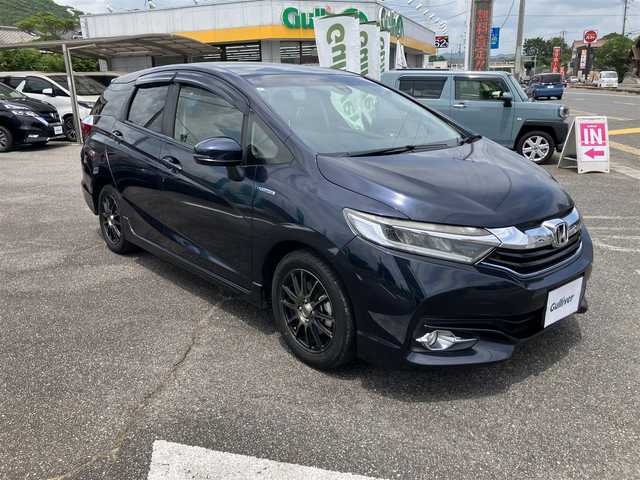 ホンダ シャトル ハイブリッド X 広島県 2017(平29)年 9.7万km ミッドナイトブルービームM ワンオーナー/純正ナビ・フルセグTV/パドルシフト/ハーフレザーシート/クルーズコントロール/LEDオートライト/バックカメラ/ビルトインETC/スマートキー/社外15インチアルミ/あんしんパッケージ