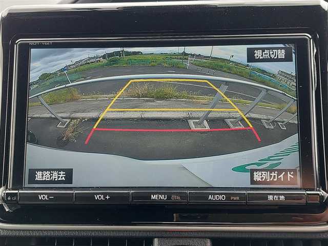 トヨタ ヴォクシー ZS 東京都 2018(平30)年 3.3万km ホワイトパールクリスタルシャイン 純正9インチナビ/フリップダウンモニター/バックカメラ/ビルトインETC2.0/ドライブレコーダー/両側パワースライドドア/衝突軽減ブレーキ/レーンキープアシスト/オートマチックハイビーム/クルーズコントロール/アイドリングストップ/スマートキー/リフトアップシート/LEDヘッドライト/純正16インチAW