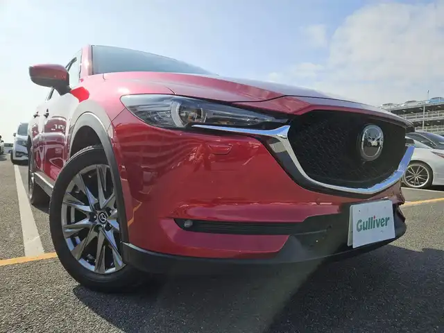 マツダ ＣＸ－５ XD エクスクルーシブモード 宮崎県 2021(令3)年 4.2万km ソウルレッドクリスタルM 4WD/純正10.25ナビ/フルセグTV/パワーバックドア/360度ビューモニター/ドライブレコーダー/後席用フリップダウンモニター/レーダークルーズコントロール/前後パーキングセンサー/衝突被害軽減ブレーキ/誤発進抑制機能/車線逸脱防止支援システム/ドライバーアテンションアラート/交通標識認識システム/ヘッドアップディスプレイ/ツインターボ/LEDヘッドランプ/革巻きステアリング/ステアリングヒーター/パドルシフト/ナッパ革シート/全席シートヒーター/前席パワーシート/ベンチレーション/BOSEサウンドシステム/純正19インチアルミホイール/スマートキー/プッシュエンジンスタート/禁煙車
