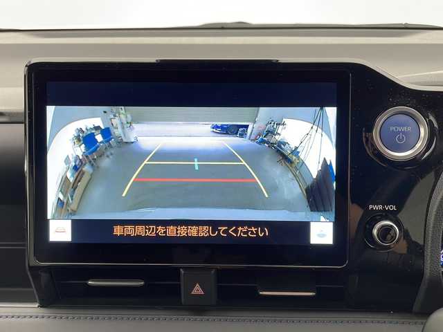 トヨタ ヴォクシー ハイブリッド S－Z 宮崎県 2022(令4)年 1.4万km ホワイトパールクリスタルシャイン 禁煙車/トヨタセーフティセンス/純正10.5型ディスプレイオーディオナビTV/（T-CONNECT/CD/DVD/Bluetooth/フルセグTV)/純正バックカメラ/純正ビルトイン2.0ETC/純正モデリスタエアロ/純正17インチアルミ/純正LEDオートライト/純正フロアマット/両側電動スライドドア/アダプティブクルーズコントロール/レーンディパーチャーアラート/オートマチックハイビーム/クリアランスソナー/電子パーキング/前後ドライブレコーダー/AC100V/本革巻ハンドル/Wオートエアコン（ナノイーX）/前席シートヒーター/ハーフレザーシート/スマートキー/プッシュエンジンスタート/スペアキー/新車時保証書/取扱い説明書