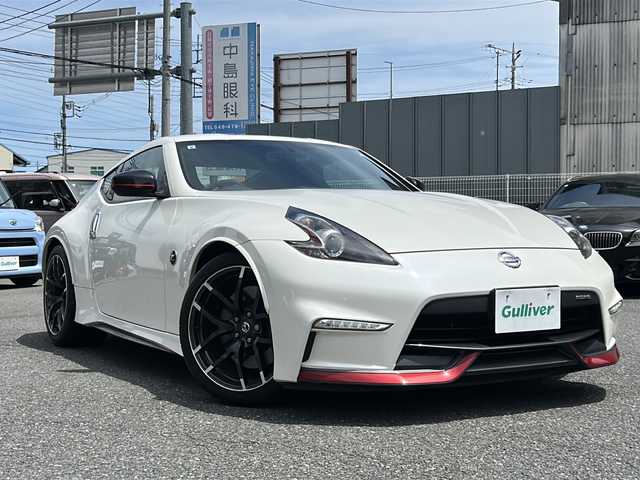 日産 フェアレディ Ｚ ニスモ 埼玉県 2015(平27)年 5万km ブリリアントホワイトパール 外部検査済み/登録時走行距離49167km/純正メーカーHDDナビゲーション/(CD/DVD)/フルセグテレビ/バックカメラ/純正RAYS鍛造１９インチアルミホイール/専用レカロハーフレザーシート/パドルシフト/ETC(ビルトイン)/HIDヘッドライト/LEDフォグランプ/BOSEサラウンドシステム/電動格納ミラー/オートライト/ステアリングリモコン/プッシュスタート/スマートキー/スペアキー/新車保証書/取扱説明書