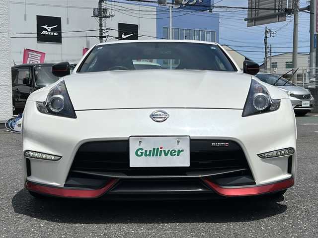日産 フェアレディ Ｚ ニスモ 埼玉県 2015(平27)年 5万km ブリリアントホワイトパール 外部検査済み/登録時走行距離49167km/純正メーカーHDDナビゲーション/(CD/DVD)/フルセグテレビ/バックカメラ/純正RAYS鍛造１９インチアルミホイール/専用レカロハーフレザーシート/パドルシフト/ETC(ビルトイン)/HIDヘッドライト/LEDフォグランプ/BOSEサラウンドシステム/電動格納ミラー/オートライト/ステアリングリモコン/プッシュスタート/スマートキー/スペアキー/新車保証書/取扱説明書