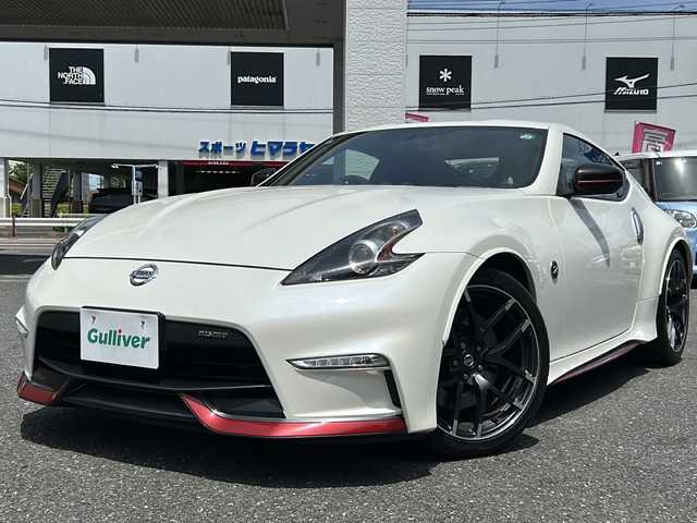 日産 フェアレディ Ｚ ニスモ 埼玉県 2015(平27)年 5万km ブリリアントホワイトパール 外部検査済み/登録時走行距離49167km/純正メーカーHDDナビゲーション/(CD/DVD)/フルセグテレビ/バックカメラ/純正RAYS鍛造１９インチアルミホイール/専用レカロハーフレザーシート/パドルシフト/ETC(ビルトイン)/HIDヘッドライト/LEDフォグランプ/BOSEサラウンドシステム/電動格納ミラー/オートライト/ステアリングリモコン/プッシュスタート/スマートキー/スペアキー/新車保証書/取扱説明書