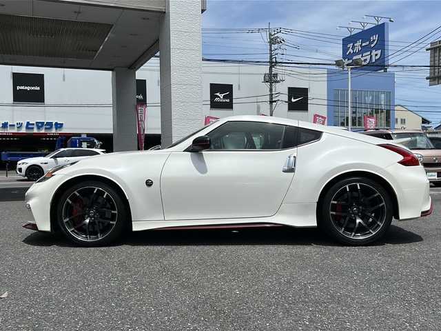 日産 フェアレディ Ｚ ニスモ 埼玉県 2015(平27)年 5万km ブリリアントホワイトパール 外部検査済み/登録時走行距離49167km/純正メーカーHDDナビゲーション/(CD/DVD)/フルセグテレビ/バックカメラ/純正RAYS鍛造１９インチアルミホイール/専用レカロハーフレザーシート/パドルシフト/ETC(ビルトイン)/HIDヘッドライト/LEDフォグランプ/BOSEサラウンドシステム/電動格納ミラー/オートライト/ステアリングリモコン/プッシュスタート/スマートキー/スペアキー/新車保証書/取扱説明書