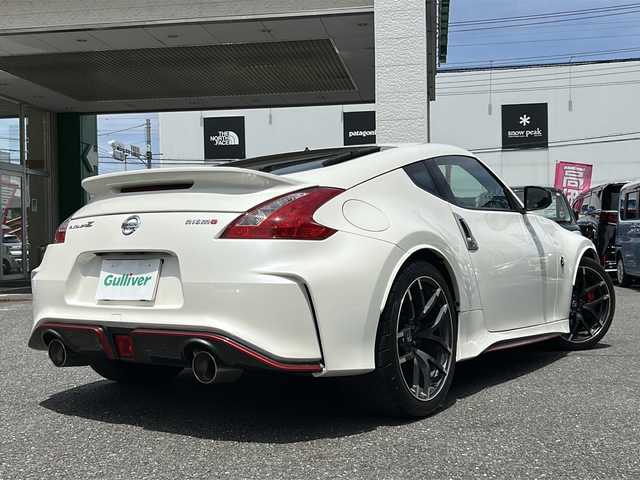 日産 フェアレディ Ｚ ニスモ 埼玉県 2015(平27)年 5万km ブリリアントホワイトパール 外部検査済み/登録時走行距離49167km/純正メーカーHDDナビゲーション/(CD/DVD)/フルセグテレビ/バックカメラ/純正RAYS鍛造１９インチアルミホイール/専用レカロハーフレザーシート/パドルシフト/ETC(ビルトイン)/HIDヘッドライト/LEDフォグランプ/BOSEサラウンドシステム/電動格納ミラー/オートライト/ステアリングリモコン/プッシュスタート/スマートキー/スペアキー/新車保証書/取扱説明書