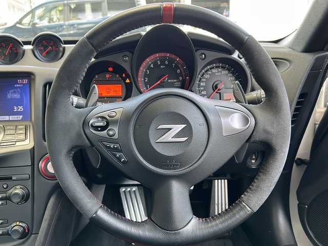 日産 フェアレディ Ｚ ニスモ 埼玉県 2015(平27)年 5万km ブリリアントホワイトパール 外部検査済み/登録時走行距離49167km/純正メーカーHDDナビゲーション/(CD/DVD)/フルセグテレビ/バックカメラ/純正RAYS鍛造１９インチアルミホイール/専用レカロハーフレザーシート/パドルシフト/ETC(ビルトイン)/HIDヘッドライト/LEDフォグランプ/BOSEサラウンドシステム/電動格納ミラー/オートライト/ステアリングリモコン/プッシュスタート/スマートキー/スペアキー/新車保証書/取扱説明書