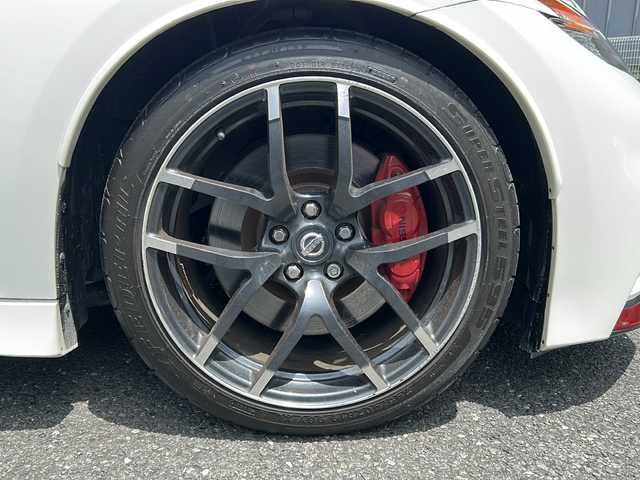 日産 フェアレディ Ｚ ニスモ 埼玉県 2015(平27)年 5万km ブリリアントホワイトパール 外部検査済み/登録時走行距離49167km/純正メーカーHDDナビゲーション/(CD/DVD)/フルセグテレビ/バックカメラ/純正RAYS鍛造１９インチアルミホイール/専用レカロハーフレザーシート/パドルシフト/ETC(ビルトイン)/HIDヘッドライト/LEDフォグランプ/BOSEサラウンドシステム/電動格納ミラー/オートライト/ステアリングリモコン/プッシュスタート/スマートキー/スペアキー/新車保証書/取扱説明書