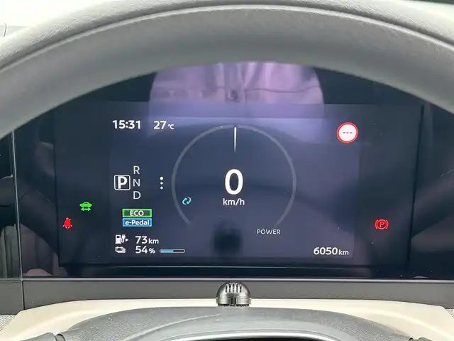 日産 サクラ X 愛媛県 2023(令5)年 0.6万km スターリングシルバーメタリック 禁煙車/登録時走行距離6049km/純正ナビCD/DVD/フルセグTV/Bluetooth/全方位カメラ（フロント/サイド/リヤ）/エマージェンシーブレーキ/踏み間違え防止装置/オートライト/オートハイビーム/LEDヘッドライト/電動パーキングブレーキ/オートブレーキホールド/スマートキー/プッシュスタートボタン/充電ケーブル