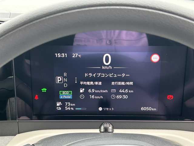 日産 サクラ X 愛媛県 2023(令5)年 0.6万km スターリングシルバーメタリック 禁煙車/登録時走行距離6049km/純正ナビCD/DVD/フルセグTV/Bluetooth/全方位カメラ（フロント/サイド/リヤ）/エマージェンシーブレーキ/踏み間違え防止装置/オートライト/オートハイビーム/LEDヘッドライト/電動パーキングブレーキ/オートブレーキホールド/スマートキー/プッシュスタートボタン/充電ケーブル