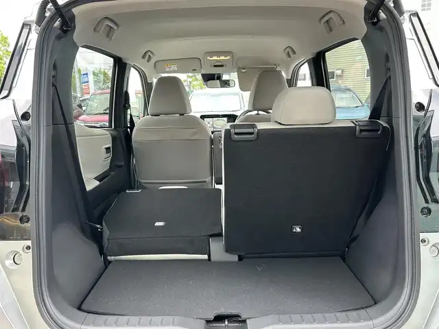 日産 サクラ X 愛媛県 2023(令5)年 0.6万km スターリングシルバーメタリック 禁煙車/登録時走行距離6049km/純正ナビCD/DVD/フルセグTV/Bluetooth/全方位カメラ（フロント/サイド/リヤ）/エマージェンシーブレーキ/踏み間違え防止装置/オートライト/オートハイビーム/LEDヘッドライト/電動パーキングブレーキ/オートブレーキホールド/スマートキー/プッシュスタートボタン/充電ケーブル