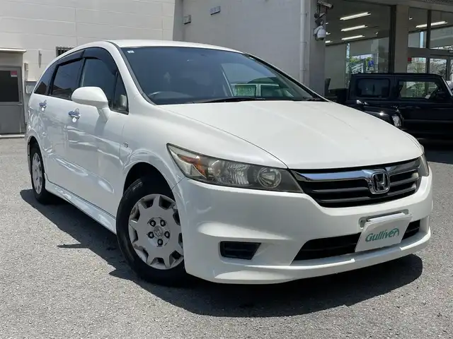 ホンダ ストリーム X スタイリッシュ パッケージ 和歌山県 2009(平21)年 12万km プレミアムホワイトパール 社外HDDナビ/＜フルセグTV/FM/AM/CD/DVD/iPod/VTR/M-CD＞/ワンオーナー/3列シート/純正フロアマット/純正ドアバイザー/オートライト/取扱説明書/保証書