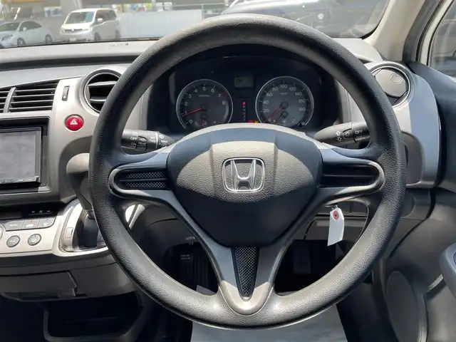 ホンダ ストリーム X スタイリッシュ パッケージ 和歌山県 2009(平21)年 12万km プレミアムホワイトパール 社外HDDナビ/＜フルセグTV/FM/AM/CD/DVD/iPod/VTR/M-CD＞/ワンオーナー/3列シート/純正フロアマット/純正ドアバイザー/オートライト/取扱説明書/保証書