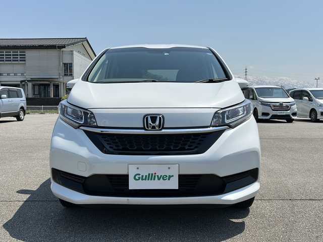 ホンダ フリード＋ ハイブリット G ホンダセンシング 富山県 2022(令4)年 4万km プラチナホワイトパール ・4WD/・ワンオーナー/・寒冷地仕様/・純正ナビ/・ワンセグ/BT/CD/・バックカメラ/・シートヒーター/・両側パワースライド/・ホンダセンシング/・アダプティブクルーズコントロール/・レーンキープアシスト/・クリアランスソナー/・アイドリングストップ/・横滑り防止装置/・ビルトインETC/・オートライト/・LEDヘッドライト/・スマートキー/・プッシュスタート