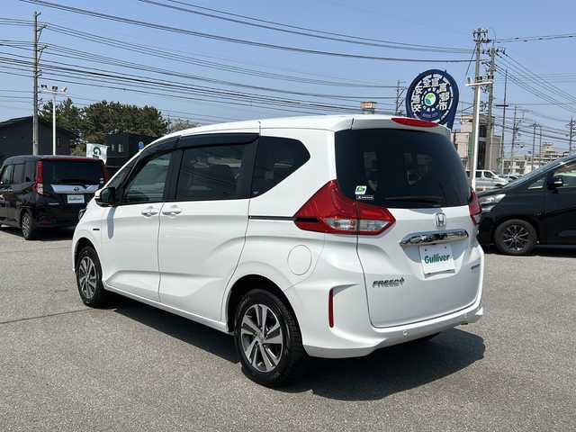 ホンダ フリード＋ ハイブリット G ホンダセンシング 富山県 2022(令4)年 4万km プラチナホワイトパール ・4WD/・ワンオーナー/・寒冷地仕様/・純正ナビ/・ワンセグ/BT/CD/・バックカメラ/・シートヒーター/・両側パワースライド/・ホンダセンシング/・アダプティブクルーズコントロール/・レーンキープアシスト/・クリアランスソナー/・アイドリングストップ/・横滑り防止装置/・ビルトインETC/・オートライト/・LEDヘッドライト/・スマートキー/・プッシュスタート