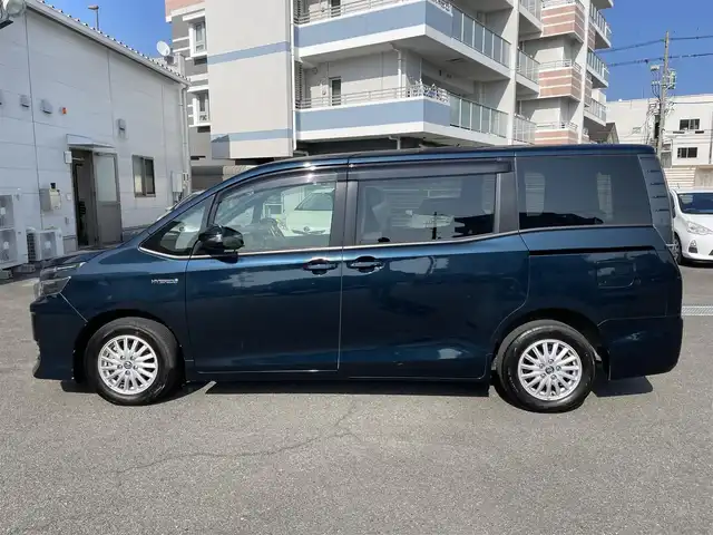 トヨタ ヴォクシー ハイブリッド X 石川県 2014(平26)年 7.2万km ブラッキッシュアゲハガラスフレーク 両側パワースライドドア/アルパインメモリナビ・フルセグTV/DVD/CD/USB/SD/Bluetooth/バックカメラ/純正15インチアルミホイール/LEDライト/ビルトインETC/スマートキー2個/プッシュスタート/新車時保証書/取扱説明書