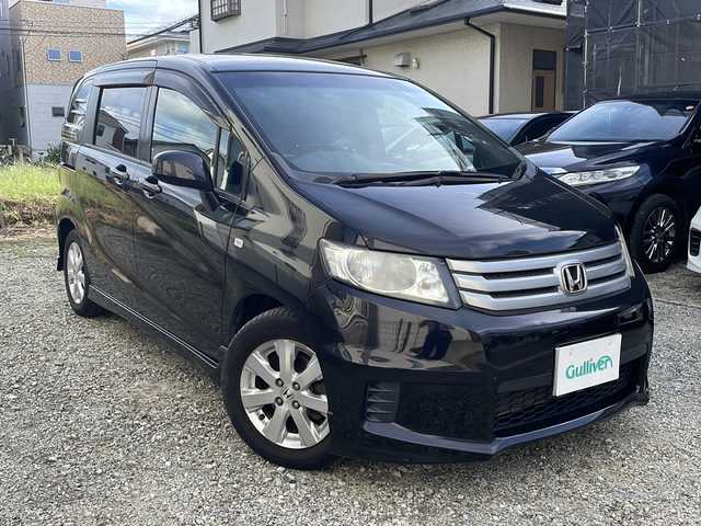 ホンダ フリード スパイク G エアロ 福岡県 2010(平22)年 11.8万km プレミアムブラキッシュパール 純正ナビ/（AM/FM/CD/DVD/ワンセグTV）/ビルドインETC/パワースライドドア（左のみ）/オートライト/電格ミラー/純正フロアマット/純正アルミホイール/保証書/取扱説明書/スペアキー×１