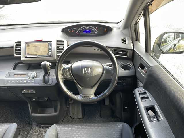 ホンダ フリード スパイク G エアロ 福岡県 2010(平22)年 11.8万km プレミアムブラキッシュパール 純正ナビ/（AM/FM/CD/DVD/ワンセグTV）/ビルドインETC/パワースライドドア（左のみ）/オートライト/電格ミラー/純正フロアマット/純正アルミホイール/保証書/取扱説明書/スペアキー×１