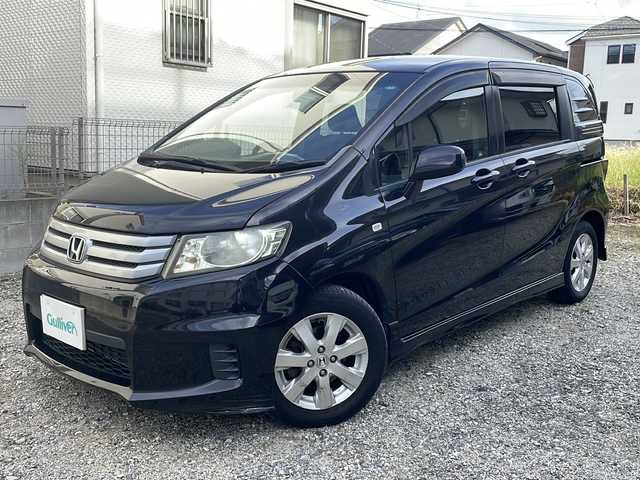 ホンダ フリード スパイク G エアロ 福岡県 2010(平22)年 11.8万km プレミアムブラキッシュパール 純正ナビ/（AM/FM/CD/DVD/ワンセグTV）/ビルドインETC/パワースライドドア（左のみ）/オートライト/電格ミラー/純正フロアマット/純正アルミホイール/保証書/取扱説明書/スペアキー×１