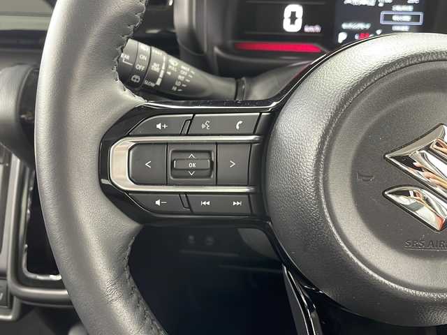 スズキ スペーシア カスタム HYBRID XS 岐阜県 2024(令6)年 1万km ピュアホワイトP スズキセーフティサポート/デュアルセンサーブレーキサポートII/ハイビームアシスト/アダプティブクルーズコントロール/レーンキープアシスト/コーナーセンサー/純正9インチナビ/　(AM/FM/Bluetooth/フルセグTV/AppleCarPlay)/全方位カメラ/ヘッドアップディスプレイ/両側パワースライドドア/ハーフレザーシート/シートヒーター/ステアリングヒーター/LEDヘッドライト/純正アルミホイール/スペアキー