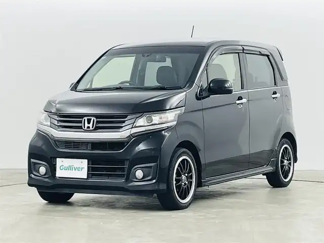ホンダ Ｎ ＷＧＮ カスタム G Aパッケージ 福島県 2014(平26)年 5万km スマートブラック 社外SDナビ/・型番：AVN-G04/・フルセグＴＶ／ＤＶＤ／ＣＤ／ＦＭ／ＡＭ/・バックカメラ/・前方ドライブレコーダー/・ETC/革巻きステアリング/・ステアリングスイッチ/・クルーズコントロール/ハーフレザーシート/・ベンチシート/プッシュスタート/・スマートキー/・スペアキー1本/電動格納ミラー/・ウィンカーミラー/HIDヘッドライト/・オートライト/・フォグランプ/純正フロアマット/純正ドアバイザー/社外15インチAW/・メーカー:S-HOLD