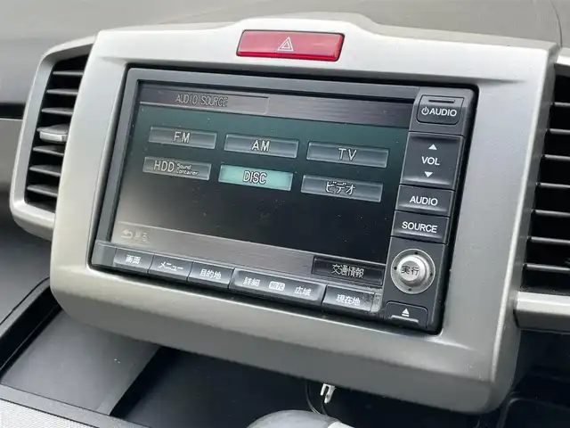 ホンダ フリード ハイブリット ジャストセレクション 長崎県 2012(平24)年 10万km プレミアムホワイトパール (株)IDOMが運営する【じしゃロン長崎店】の自社ローン専用車両になりますこちらは現金またはオートローンご利用時の価格です。自社ローンご希望の方は別途その旨お申付け下さい/ナビ　/バックカメラ　/両側パワースライドドア　/ハーフレザーシート　/クルーズコントロール　/電格ミラー　/ＨＩＤヘッドライト　/フォグランプ　/オートライト　/ＥＴＣ　/スマートキー