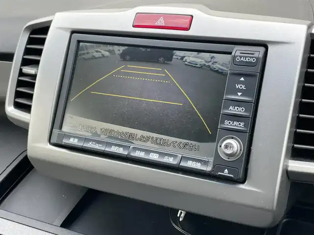 ホンダ フリード ハイブリット ジャストセレクション 長崎県 2012(平24)年 10万km プレミアムホワイトパール (株)IDOMが運営する【じしゃロン長崎店】の自社ローン専用車両になりますこちらは現金またはオートローンご利用時の価格です。自社ローンご希望の方は別途その旨お申付け下さい/ナビ　/バックカメラ　/両側パワースライドドア　/ハーフレザーシート　/クルーズコントロール　/電格ミラー　/ＨＩＤヘッドライト　/フォグランプ　/オートライト　/ＥＴＣ　/スマートキー