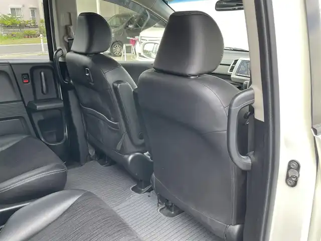 ホンダ フリード ハイブリット ジャストセレクション 長崎県 2012(平24)年 10万km プレミアムホワイトパール (株)IDOMが運営する【じしゃロン長崎店】の自社ローン専用車両になりますこちらは現金またはオートローンご利用時の価格です。自社ローンご希望の方は別途その旨お申付け下さい/ナビ　/バックカメラ　/両側パワースライドドア　/ハーフレザーシート　/クルーズコントロール　/電格ミラー　/ＨＩＤヘッドライト　/フォグランプ　/オートライト　/ＥＴＣ　/スマートキー