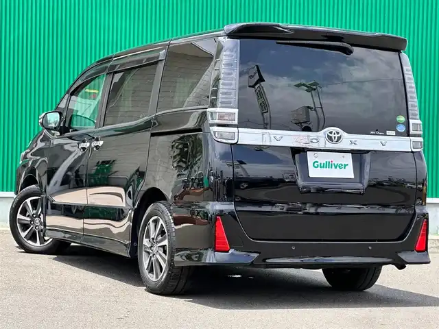 トヨタ ヴォクシー ZS 煌Ⅱ 宮城県 2019(平31)年 6.8万km ブラック Toyota Safety Sense /・プリクラッシュセーフティ/・レーンディパーチャーアラート/・オートマチックハイビーム/・発進遅れ告知機能/インテリジェントクリアランスソナー/12.1フリップダウンモニター（V12T-R66C）/純正9インチナビ【NSZT-Y66T】/・CD/DVD/・フルセグTV/・Bluetooth/・USB/ビルトインETC/両側パワースライドドア /LEDヘッドライト/フォグランプ/オートライト/革巻きステアリング/クルーズコントロール/ステアリングスイッチ/ウィンカー付電動格納式ミラー/純正16インチAW/純正フロアマット/純正ドアバイザー/Wエアバッグ/保証書