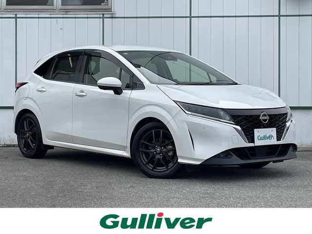 日産 ノート X 山梨県 2021(令3)年 7万km ピュアホワイトパール 純正9型ナビ/　(AM/FM/AppleCarPlay、AndroidAuto対応)/フルセグTV/インテリジェントアラウンドビューモニター/ビルトインETC2.0/ドライブレコーダー/インテリジェントクルーズコントロール/ソナー機能/プロパイロット/全方位運転支援システム/・インテリジェントエマージェンシーブレーキ/・踏み間違い衝突防止アシスト/・標識検知機能/・前方衝突予測警報/・車両逸脱防止支援システム/・ふらつき警報/・後側方衝突防止支援システム/SOSコール/インテリジェントルームミラー/アダプティブLEDヘッドランプ/ステアリングスイッチ/純正OP16インチエスティーロAW/インテリジェントキー/スペアキー/プッシュパワースターター/保証書