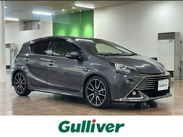 トヨタ アクア G G’s 道央・札幌 2016(平28)年 5.7万km グレーメタリック ワンオーナー/寒冷地仕様/純正SDナビ/・フルセグTV/CD/DVD/BT/SD/バックカメラ/純正エンジンスターター/社外ミラー一体型ドライブレコーダー/社外レーダー/クルーズコントロール/グレード専用ハーフレザーシート/トヨタセーフティセンス/・プリクラッシュセーフティ/・レーンディパーチャーアラート/・先行車発進お知らせ機能/横滑り防止装置/オートライト/オートハイビーム/LEDヘッドライト/フォグライト/プッシュスタート/スマートキー/スタリングリモコン/グレード専用フロアマット/ドアバイザー/ウインカーミラー/サイドエアロ/グレード専用17インチAW/グレード専用サスペンション/積込社外AW付き冬タイヤ/・175/65R15 ’21製 5mm/新車時保証書/取扱説明書