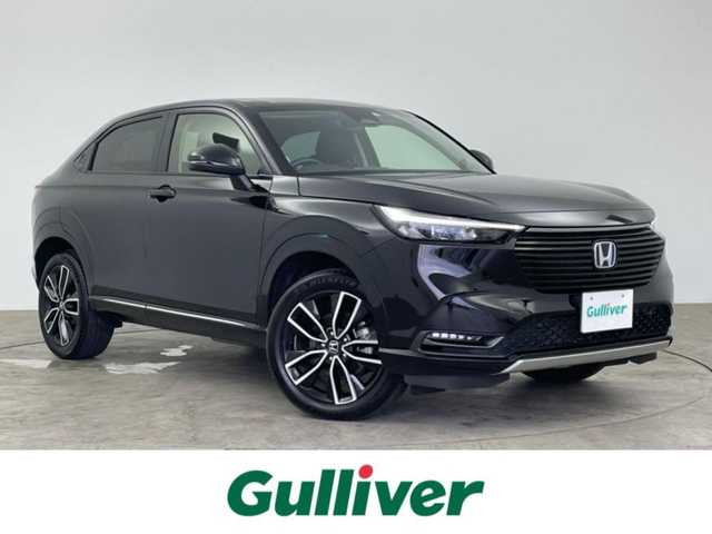 ホンダ ヴェゼル ハイブリッド e:HEV Z 大分県 2022(令4)年 4.2万km クリスタルブラックパール Honda SENSING/・衝突軽減ブレーキ（CMBS）/・誤発進抑制機能/・後方誤発進抑制機能/・近距離衝突軽減ブレーキ/・歩行者事故低減ステアリング/・路外逸脱抑制機能/・渋滞追従機能付アダプティブクルーズコントロール（ACC）/・車線維持支援システム（LKAS）/・トラフィックジャムアシスト（渋滞運転支援機能）/・先行車発進お知らせ機能/・標識認識機能/・オートハイビーム/・パーキングセンサーシステム/・アダプティブドライビングビーム/・ブラインドスポットインフォメーション/Honda CONNECTディスプレー/(フルセグTV/BT対応/USB、AM/FM//AppleCarPlay/AndroidAuto)/ステアリングスイッチ/バックカメラ/ETC2.0車載器/ワイヤレス充電/ステアリングヒーター/パワーバックドア/電動格納ミラー/ハーフレザーシート/・前席シートヒーター/オートライト/LEDヘッドライト/LEDフォグ/純正18インチアルミホイール/保証書、取説、スペアキー有り