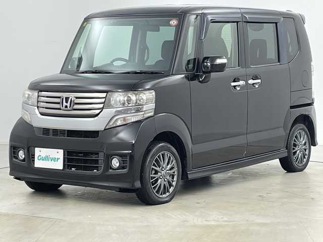 ホンダ Ｎ ＢＯＸ ＋ カスタム G 道央・札幌 2014(平26)年 10.6万km スマートブラック ・4WD/・純正ナビ&CD&DVD&SD&BT&TV/・バックカメラ/・アイドリングストップ/・ドアミラーヒーター/・HIDヘッドライト/・オートライト/・純正エンジンスターター/・スマートキー/・スペアキー