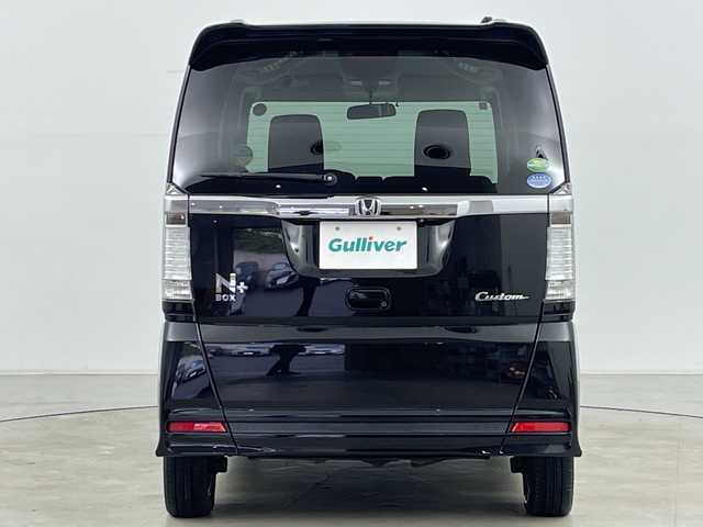 ホンダ Ｎ ＢＯＸ ＋ カスタム G 道央・札幌 2014(平26)年 10.6万km スマートブラック ・4WD/・純正ナビ&CD&DVD&SD&BT&TV/・バックカメラ/・アイドリングストップ/・ドアミラーヒーター/・HIDヘッドライト/・オートライト/・純正エンジンスターター/・スマートキー/・スペアキー