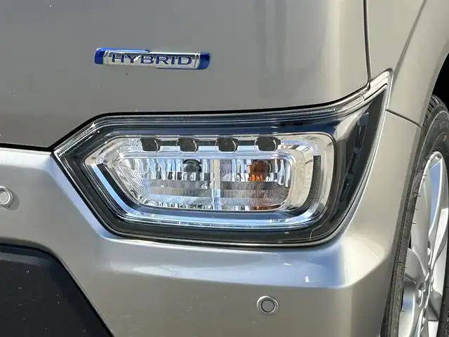 スズキ ワゴンＲ スティングレー HYBRID X 山形県 2021(令3)年 1.4万km スチールシルバーM 禁煙車/4WD/社外オーディオ/・AM/FM/CD/AUX/アイドリングストップ/コーナーセンサー/衝突被害軽減ブレーキ/車線逸脱警報/横滑り防止装置/盗難防止装置/LEDヘッドライト/オートライト/フロントフォグランプ/シートヒーター（D/N席）/フロアマット/冬タイヤ積み込み/保証書/取扱説明書