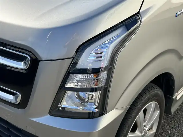 スズキ ワゴンＲ スティングレー HYBRID X 山形県 2021(令3)年 1.4万km スチールシルバーM 禁煙車/4WD/社外オーディオ/・AM/FM/CD/AUX/アイドリングストップ/コーナーセンサー/衝突被害軽減ブレーキ/車線逸脱警報/横滑り防止装置/盗難防止装置/LEDヘッドライト/オートライト/フロントフォグランプ/シートヒーター（D/N席）/フロアマット/冬タイヤ積み込み/保証書/取扱説明書