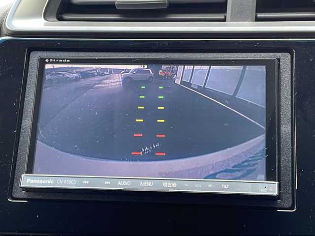 ホンダ フィット 13G Lパッケージ 山形県 2014(平26)年 10万km プレミアムホワイトパール 禁煙車/4WD/寒冷地仕様/横滑り防止装置/社外SDナビ/（Bluetooth/CD/DVD/フルセグ)/バックカメラ/LEDオートライト/ステアリングスイッチ/ETC/社外AW/純正フロアマット/電動格納ウィンカーミラー/スマートキー×2/エンジンスターター/ドアバイザー