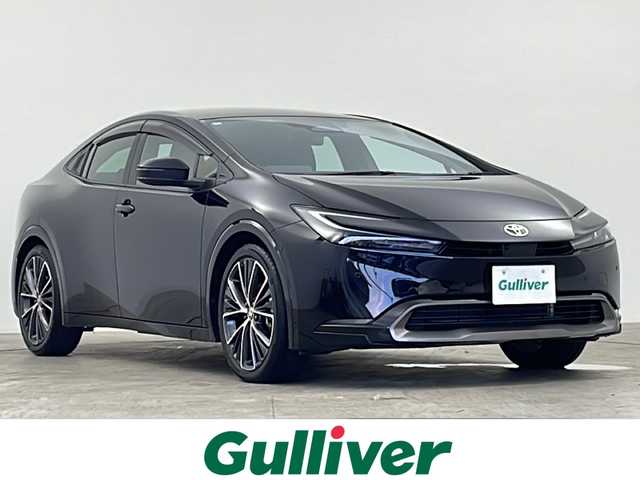 トヨタ プリウス Z 千葉県 2024(令6)年 0.6万km アティチュードブラックマイカ 禁煙車/ワンオーナー/トヨタセーフティセンス/パノラマルーフ/パワーバックドア/12.3型ディスプレイオーディオプラス/コネクティッドナビ/フルセグTV/アラウンドビューモニター/アドバンスドパーク/レーダークルーズコントロール/レーンアシスト/デジタルインナーミラー/ブラインドスポットモニター/合皮レザーシート/シートヒーター/シートベンチレーション/ステアリングヒーター/パワーシート/メモリシート/LEDオートライト/オートハイビーム/ビルトインETC/電動パーキング/オートブレーキホールド/ステアリングスイッチ/横滑り防止機能/ワイヤレス充電/AC100V/純正19インチアルミホイール/純正フロアマット