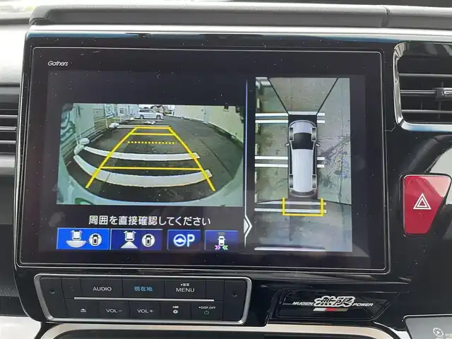ホンダ ステップワゴン eHEVモデューロX ホンダS 三重県 2020(令2)年 5万km プラチナホワイトパール 登録時49297km/禁煙車/ハーフレザーシート/純正フリップダウンモニター/純正10インチナビ/（AM/FM/TV/Bluetooth/CD/DVD/HDMI）/フルセグTV/バックカメラ/ビルトインETC2.0/純正ドライブレコーダー/レーダークルーズコントロール/ステアリングスイッチ/パドルシフト/オートライト/両側パワースライドドア/シートヒーター/衝突軽減システム/レーンキープアシスト/コーナーセンサー/プッシュスタート/純正フロアマット/純正アルミ/スペアキー