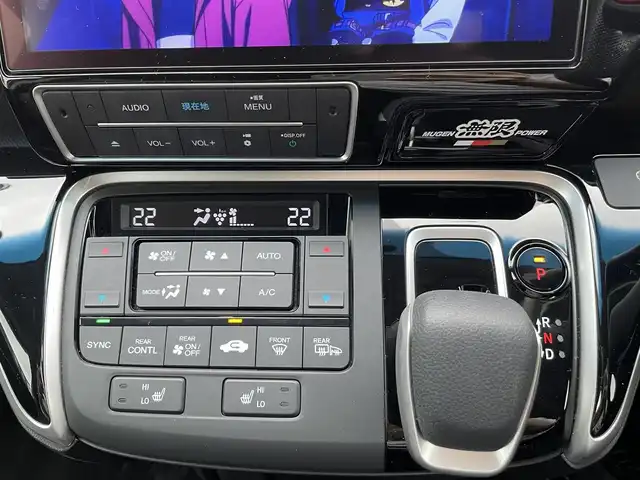 ホンダ ステップワゴン eHEVモデューロX ホンダS 三重県 2020(令2)年 5万km プラチナホワイトパール 登録時49297km/禁煙車/ハーフレザーシート/純正フリップダウンモニター/純正10インチナビ/（AM/FM/TV/Bluetooth/CD/DVD/HDMI）/フルセグTV/バックカメラ/ビルトインETC2.0/純正ドライブレコーダー/レーダークルーズコントロール/ステアリングスイッチ/パドルシフト/オートライト/両側パワースライドドア/シートヒーター/衝突軽減システム/レーンキープアシスト/コーナーセンサー/プッシュスタート/純正フロアマット/純正アルミ/スペアキー