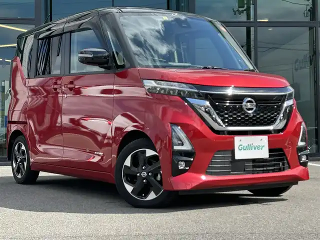 日産 ルークス ハイウェイスター X 愛媛県 2023(令5)年 1.8万km スパークリングレッド/ブラック Strada7型ナビ/全周囲カメラ/左側電動スライドドア/左側ハンズフリースライド/セーフティシールド/衝突被害軽減装置/車線逸脱防止装置/クリアランスソナー/リアサーキュレーター/アイドリングストップ/LEDヘッドライト/ステアリングリモコン/純正ドアバイザー/フロアマット/電格ミラー/シガーソケット/ヘッドライトレベライザー/現状サマー(純正AW)(155/65/R14)/YOKOHAMA BleEarth-GT AE51/禁煙車