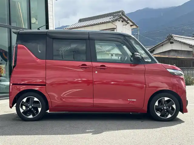 日産 ルークス ハイウェイスター X 愛媛県 2023(令5)年 1.8万km スパークリングレッド/ブラック Strada7型ナビ/全周囲カメラ/左側電動スライドドア/左側ハンズフリースライド/セーフティシールド/衝突被害軽減装置/車線逸脱防止装置/クリアランスソナー/リアサーキュレーター/アイドリングストップ/LEDヘッドライト/ステアリングリモコン/純正ドアバイザー/フロアマット/電格ミラー/シガーソケット/ヘッドライトレベライザー/現状サマー(純正AW)(155/65/R14)/YOKOHAMA BleEarth-GT AE51/禁煙車