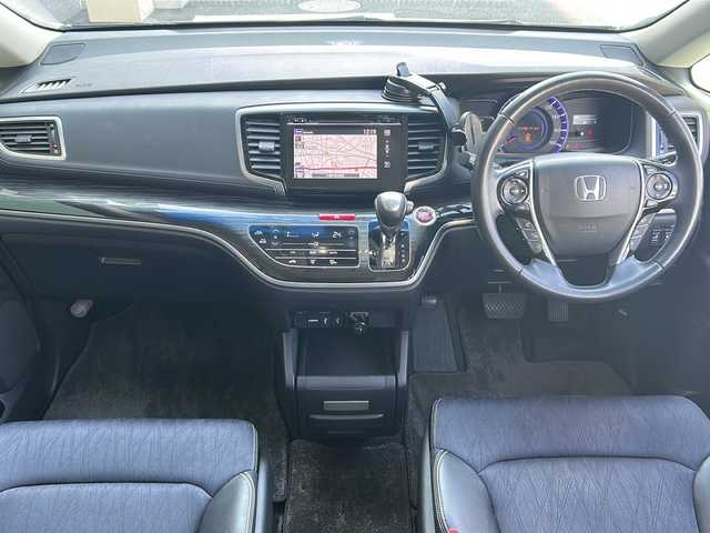 ホンダ オデッセイ アブソルート アドバンス 広島県 2015(平27)年 8.3万km ホワイトオーキッドパール 禁煙車/OP18インチアルミホイール/ホンダセンシング/・衝突軽減ブレーキ〈CMBS〉/・誤発進抑制機能/・路外逸脱抑制機能/・渋滞追従機能付ACC〈アダプティブ・クルーズ・コントロール〉/・LKAS〈車線維持支援システム〉/・先行車発進お知らせ機能/・標識認識機能/純正メーカーナビ/・フルセグ/・CD/DVD/・HDMI/USB/純正フリップダウンモニター（VM-155EN）/マルチビューカメラシステム/スマートパーキングアシスト/革巻きステアリング/ステアリングスイッチ/パドルシフト/LEDヘッドライト/フォグランプ/LED室内灯/コンフォートビューパッケージ/両側パワースライドドア/パワーシート/コンビシート/2列目プレミアムクレードルシート/スマートキー/プッシュスタート/スペアキー/前ドライブレコーダー/ETC/W+サイド+カーテンエアバック