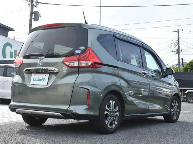 ホンダ フリード＋ クロスター ホンダセンシング 神奈川県 2019(令1)年 2.9万km シルバーミストグリーンM ワンオーナー/純正メモリナビ/フルセグテレビ/バックカメラ/アダプティブクルーズコントロール/プッシュスタート/スマートキー/両側パワースライドドア/ETC/LEDヘッドライト/スペスマートキー/保証書/取説/ナビ説/記録(R.2.3.5)