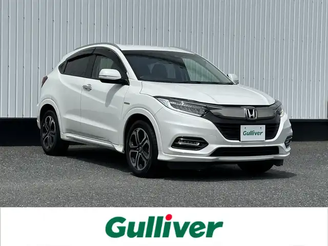 ホンダ ヴェゼル ハイブリッド Z ホンダセンシング 千葉県 2020(令2)年 4.4万km プラチナホワイトパール 純正8インチナビ/(フルセグTV/CD/DVD/BT/FM/AM）/バックカメラ/衝突被害軽減システム/車線逸脱警報/クルーズコントロール/ハーフレザーシート/シートヒーター/横滑り防止装置/ETC/アイドリングストップ/LEDヘッドライト/オートライト/ウィンカーミラー/電動格納ミラー/純正17インチAW/シートリフター/プッシュスタート/スマートキー/フロアマット/ドアバイザー/スペアキー/取扱説明書/保証書