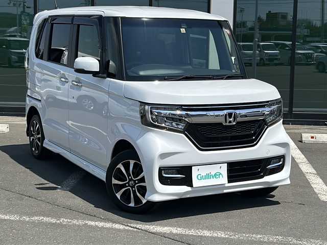 ホンダ Ｎ ＢＯＸ カスタム G L ホンダセンシング 道東・釧路十勝 2019(令1)年 7万km プラチナホワイトパール ・４WD/・純正8インチSDメモリナビ/（CD・DVD・AM・FM・BT・SD・iPod）/・バックカメラ/・ETC/・純正エンジンスターター/・両側パワースライドドア/・レーダークルーズコントロール/・リアコーナーセンサー/・レーンキープアシスト/・横滑り防止装置/・オートライト/・LEDヘッドライト/・スマートキー/・プッシュスタート/・ハーフレザーシート/・前席シートヒーター/・純正アルミホイール/・保証書/・取扱説明書