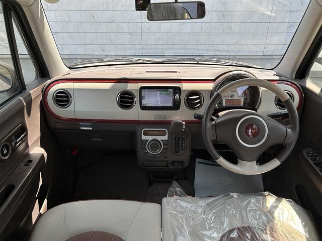 スズキ ラパン ショコラ X 埼玉県 2014(平26)年 7.7万km ピンク 純正ナビオーディオ/（AM/FM/BT/iPod/AUX/SD）/ワンセグテレビ/バックカメラ/アイドリングストップ/ドライブレコーダー前後/スペアキー１本（スマートキー）/プッシュスタード/純正フロアマット/保証書/車両/ナビ 取扱説明書