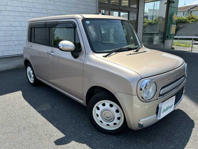 スズキ ラパン ショコラ X 埼玉県 2014(平26)年 7.7万km ピンク 純正ナビオーディオ/（AM/FM/BT/iPod/AUX/SD）/ワンセグテレビ/バックカメラ/アイドリングストップ/ドライブレコーダー前後/スペアキー１本（スマートキー）/プッシュスタード/純正フロアマット/保証書/車両/ナビ 取扱説明書