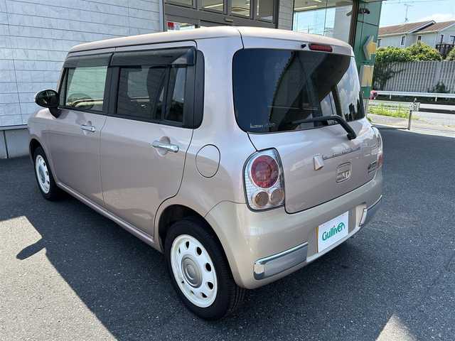 スズキ ラパン ショコラ X 埼玉県 2014(平26)年 7.7万km ピンク 純正ナビオーディオ/（AM/FM/BT/iPod/AUX/SD）/ワンセグテレビ/バックカメラ/アイドリングストップ/ドライブレコーダー前後/スペアキー１本（スマートキー）/プッシュスタード/純正フロアマット/保証書/車両/ナビ 取扱説明書